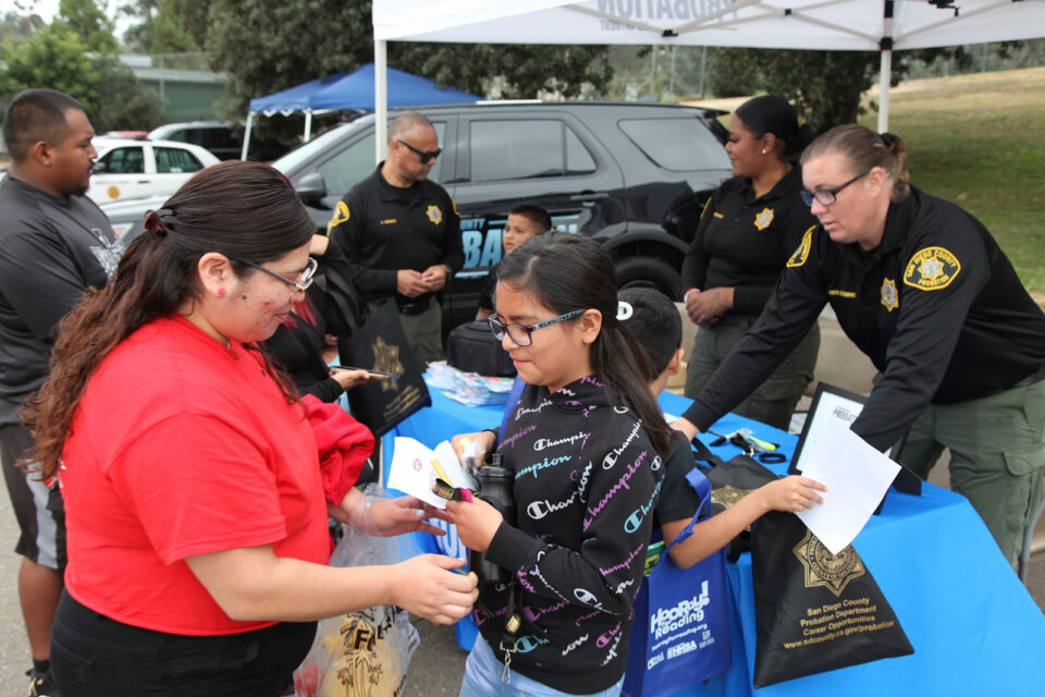 Mom, daughter examine items given to them