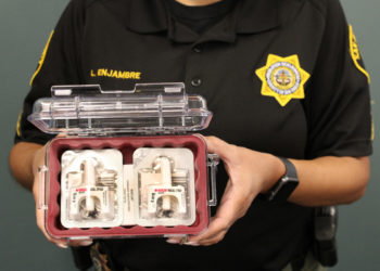 probation officer holding the naloxone they carry.