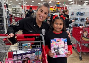 County Probation officer with girl at Shop with a Cop