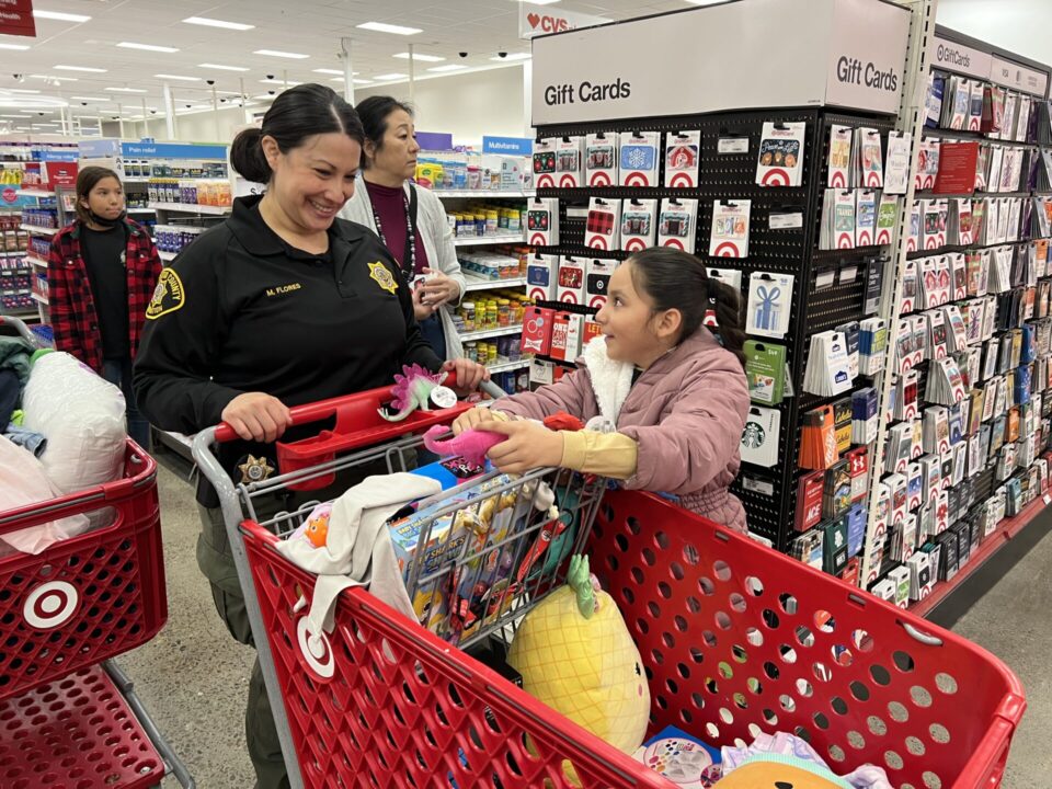 girl and probation officer shopping