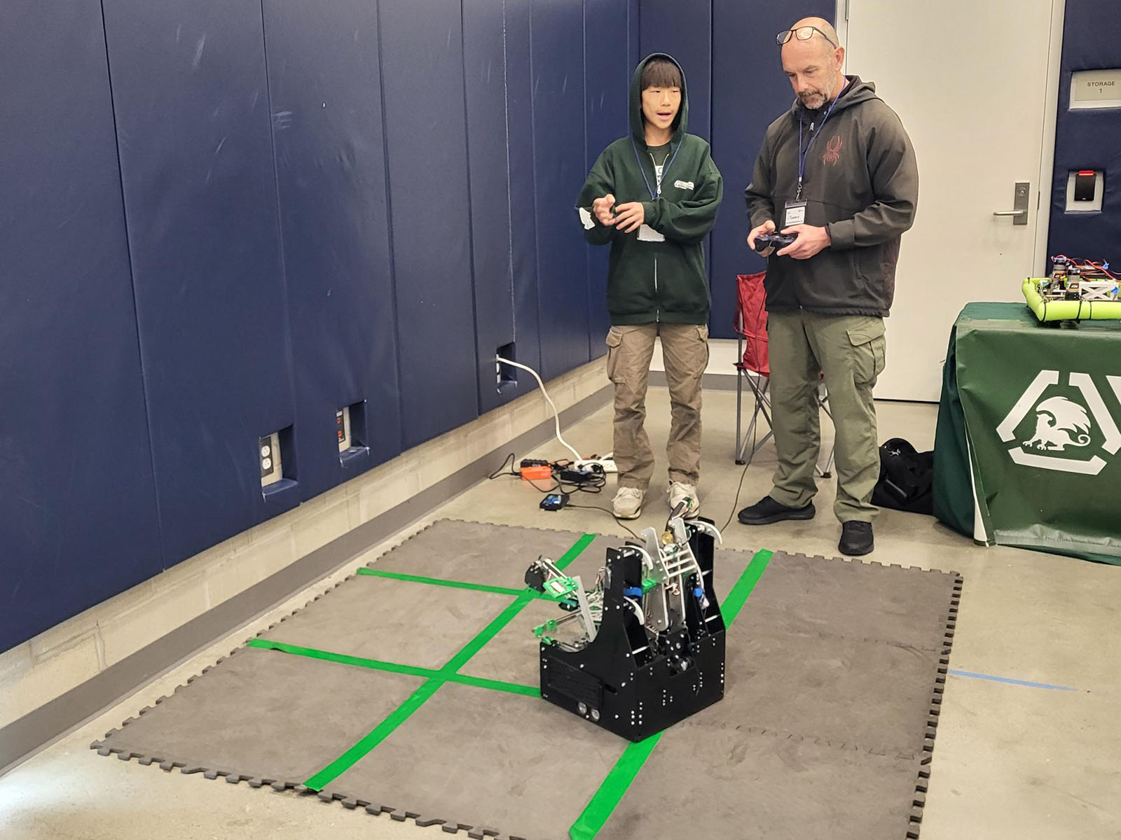 Probation officer takes the controls for a robot.