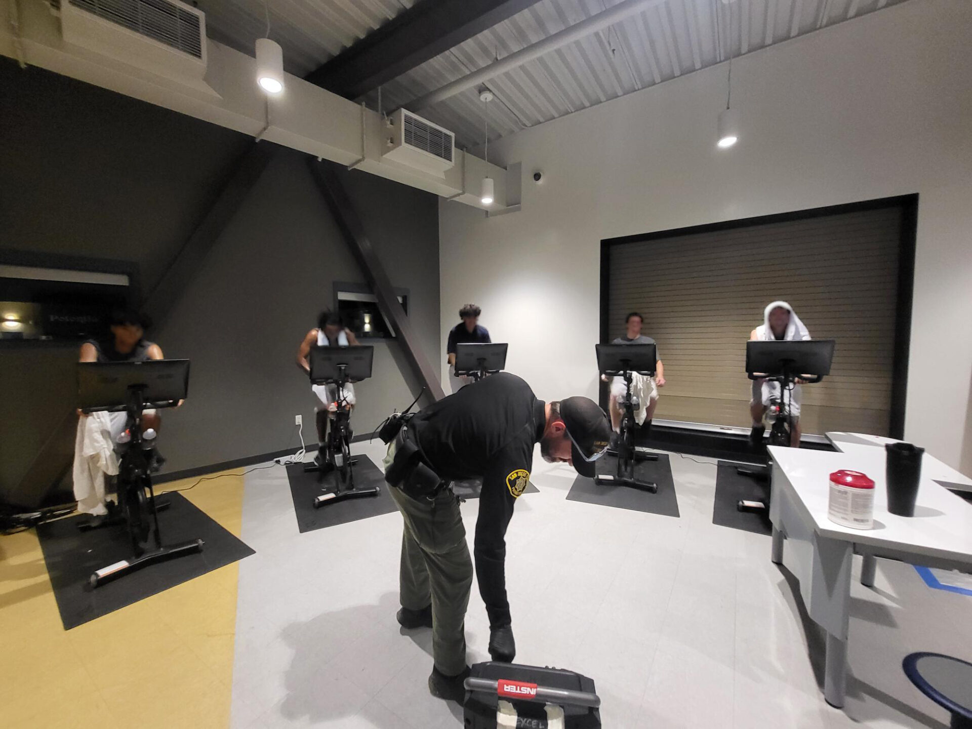 Teens on Peloton bikes