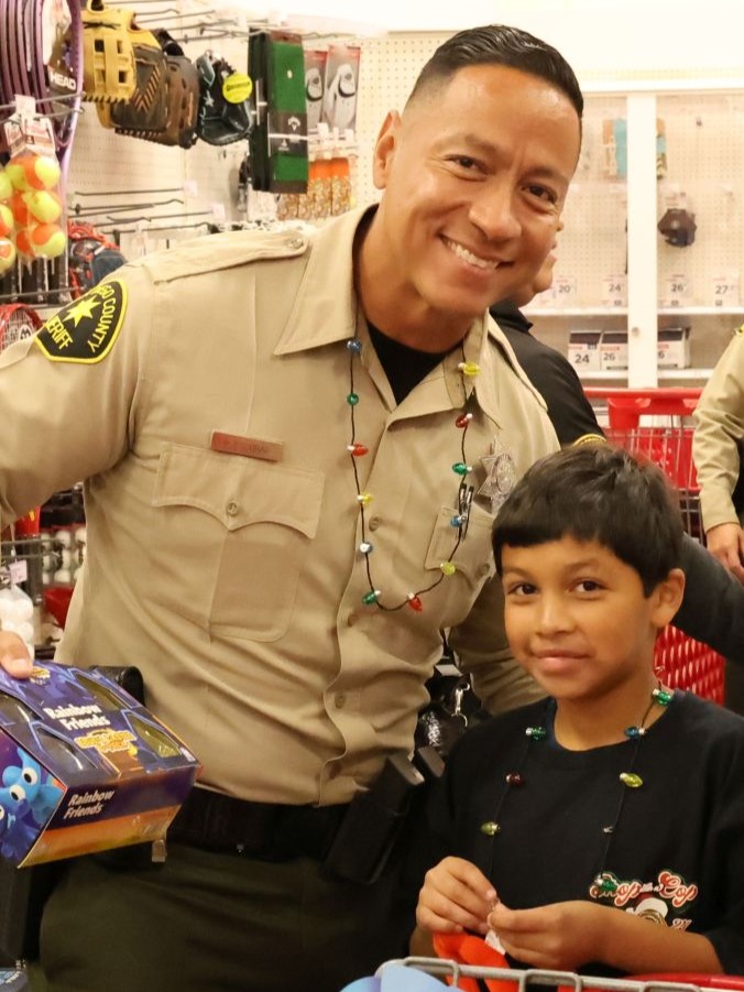 Sheriff deputy with boy