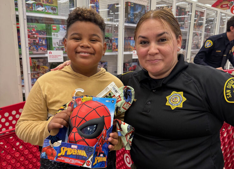 Probation officer and boy at Shop with a Cop event