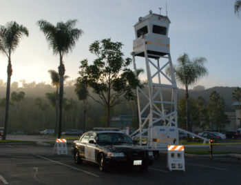 Sheriffs Patrol car and sky watch tower in parking lot