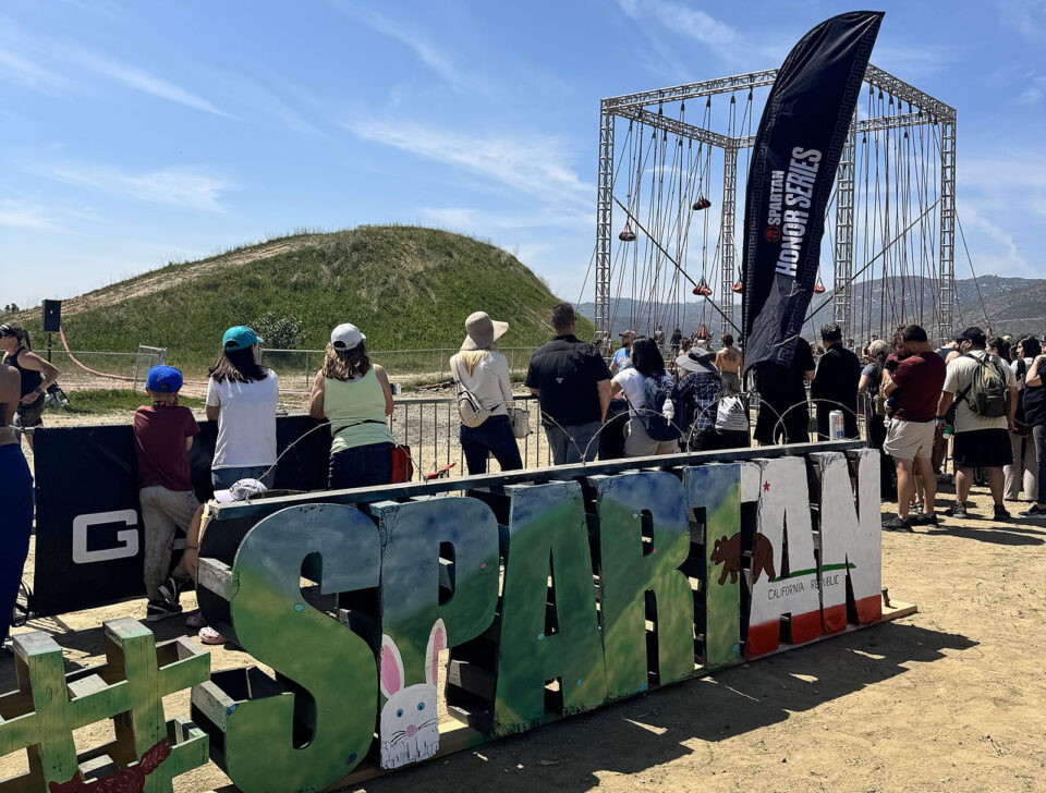 People watching runners compete in a 5K race