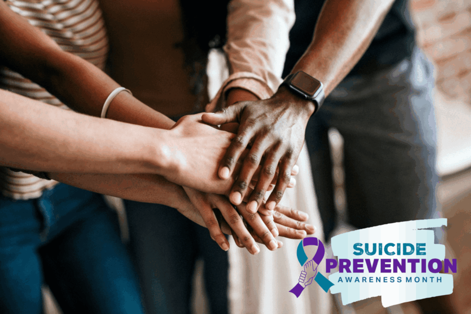 People put their hands together, suicide prevention awareness month