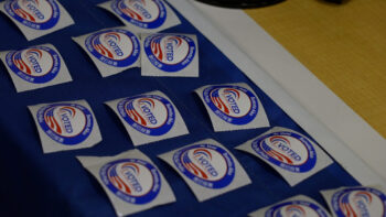 I Voted stickers on a table.