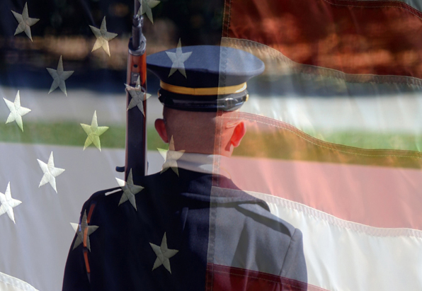A photo f a soldier and the U.S. flag