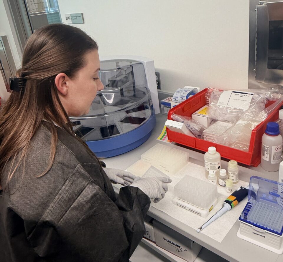 Public Health lab epidemiologist works on wastewater testing samples