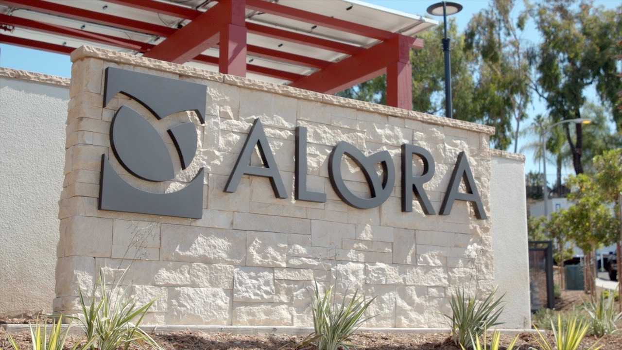 Brick wall with "Alora"