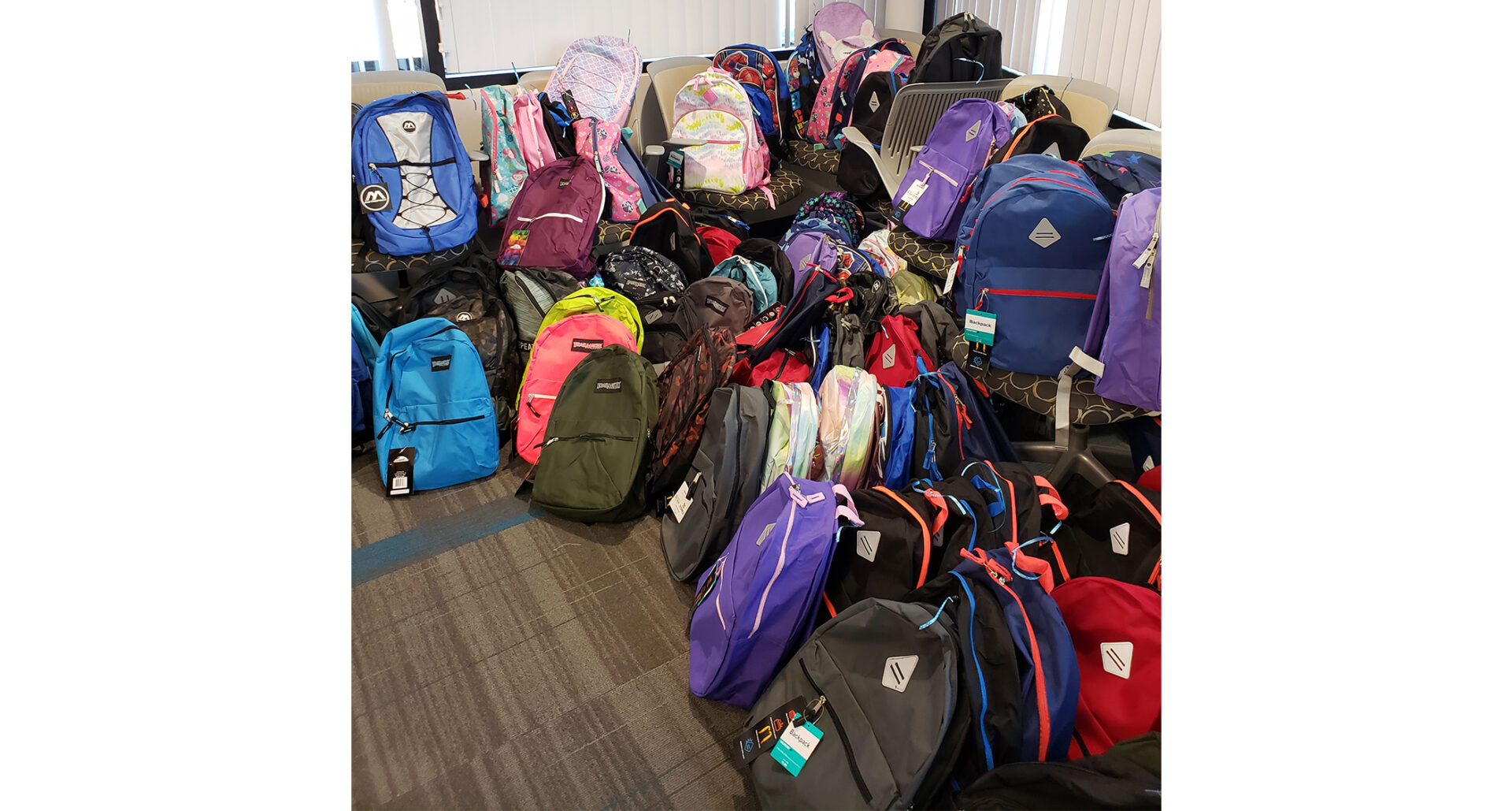 backpacks setup in a room on the floor