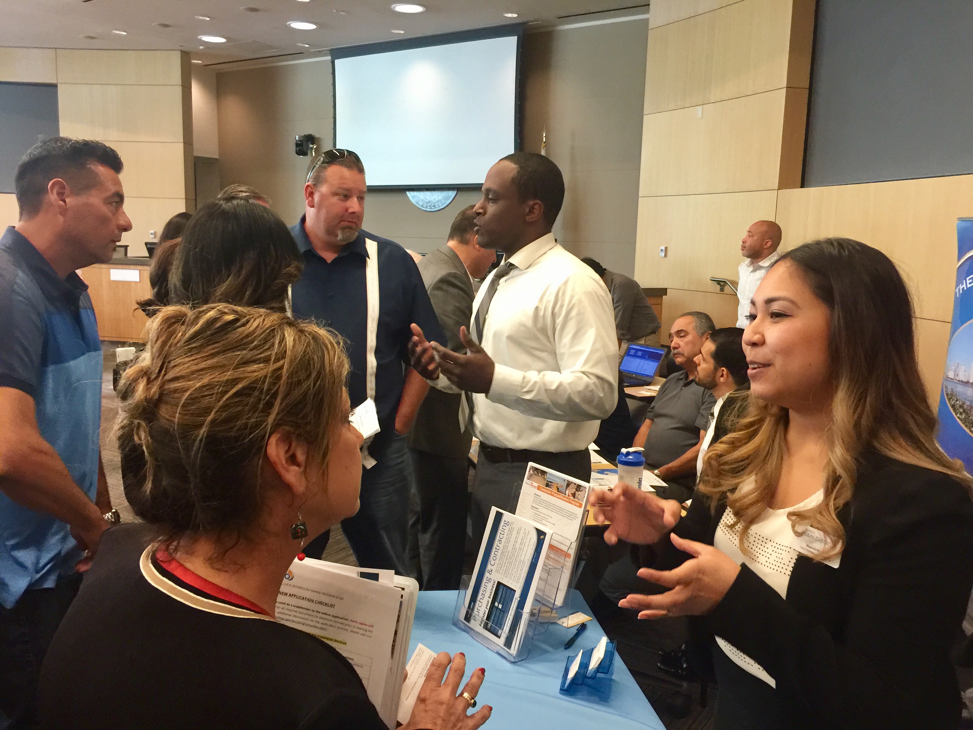 Vendor representatives from the community talk to City of San Diego staff about the procurement system.