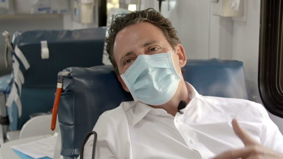 Chair Fletcher donating blood