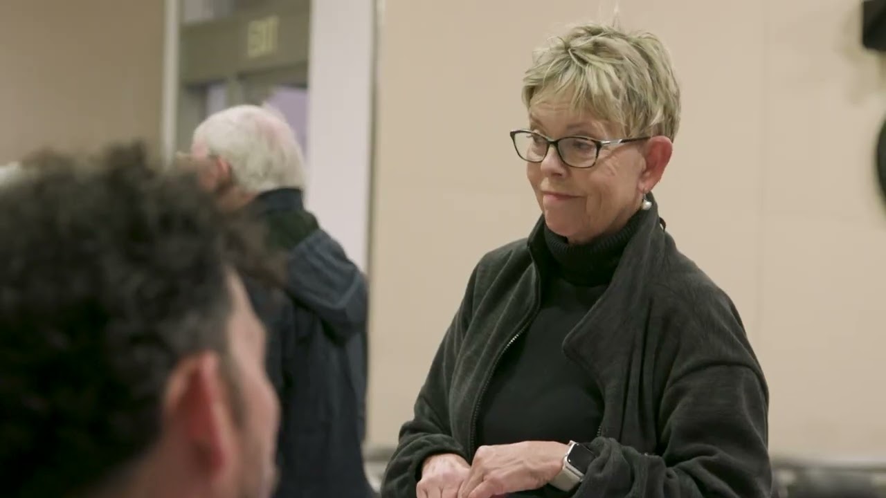 person listens intently