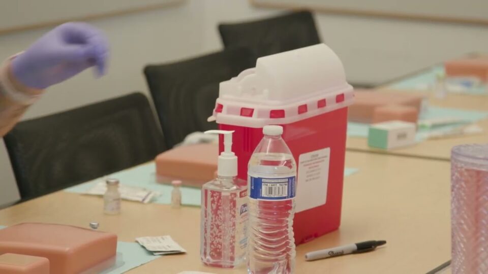 flu shot materials on table at flu shot event