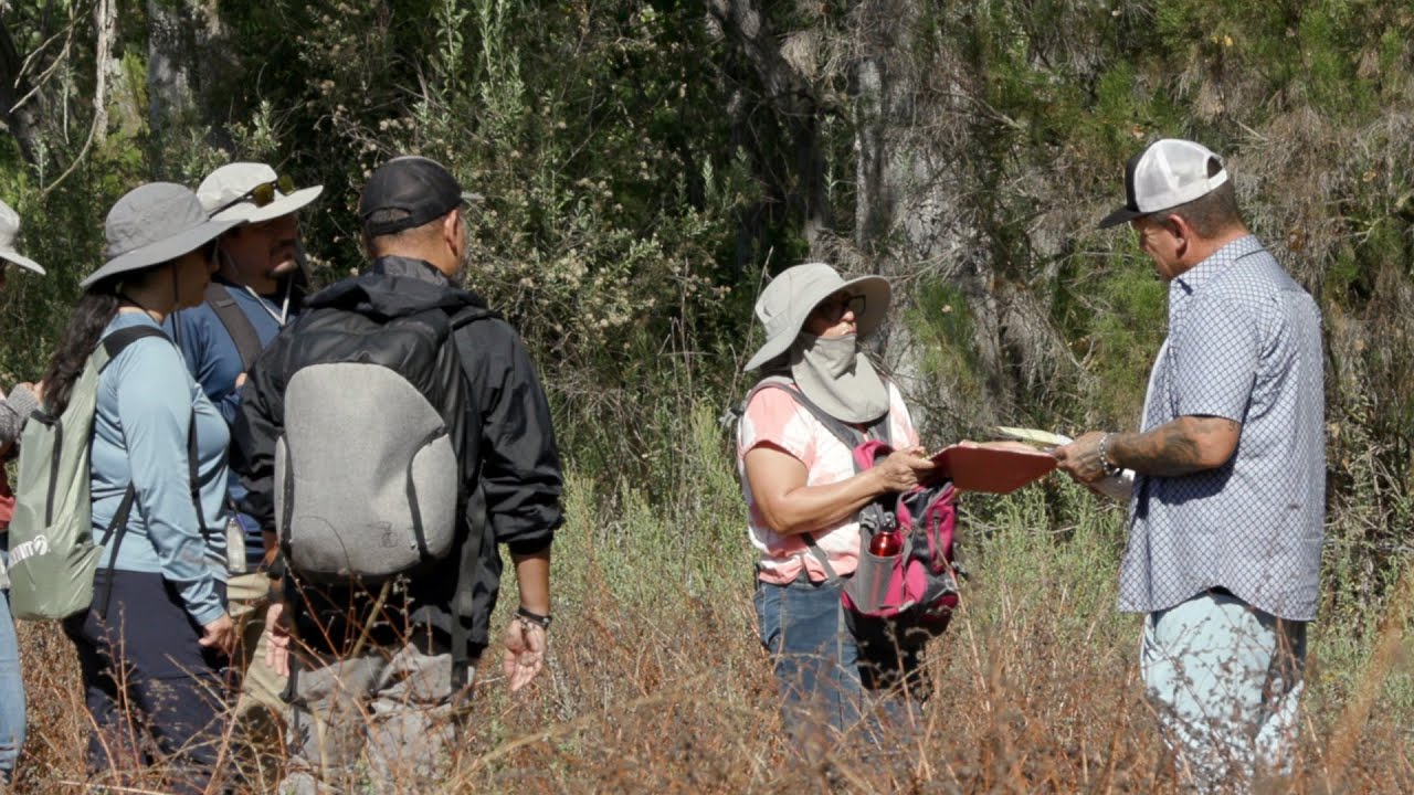 people along riverbed