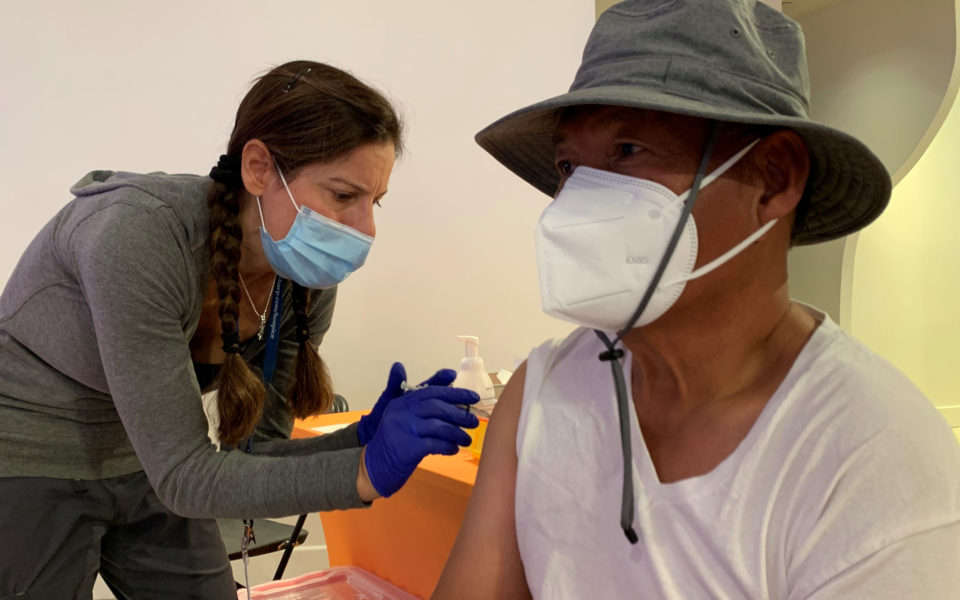 Person gets vaccinated