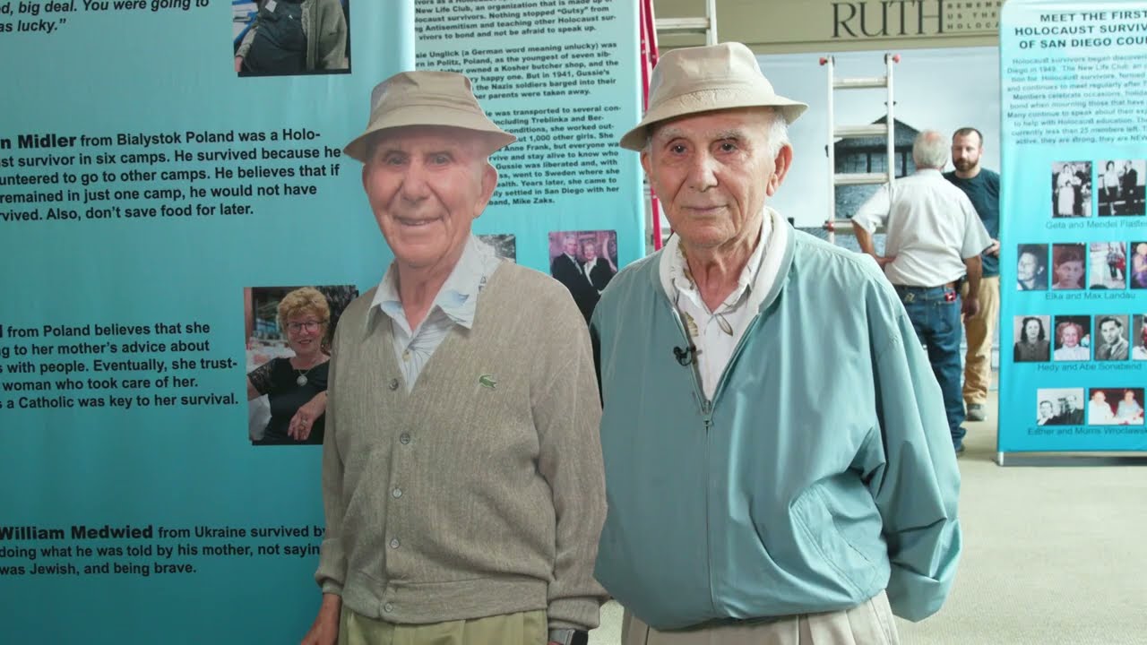 man stand in front of display