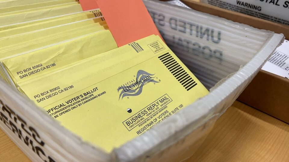 ballots in a mail bin