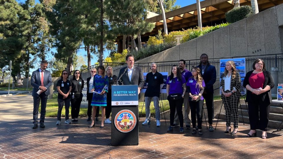 group stands near podium