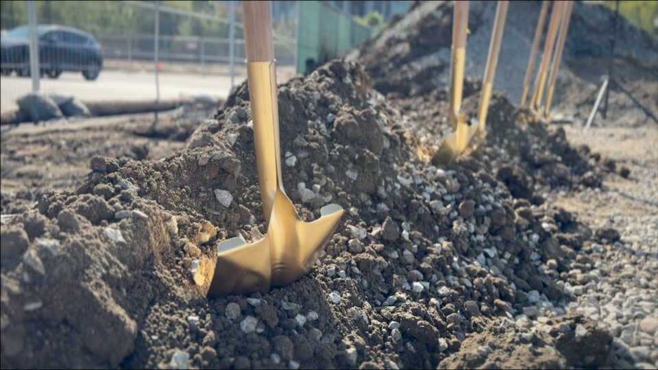 shovels in heap of dirt