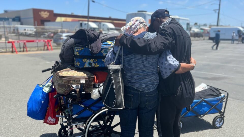 two people with arm around each other