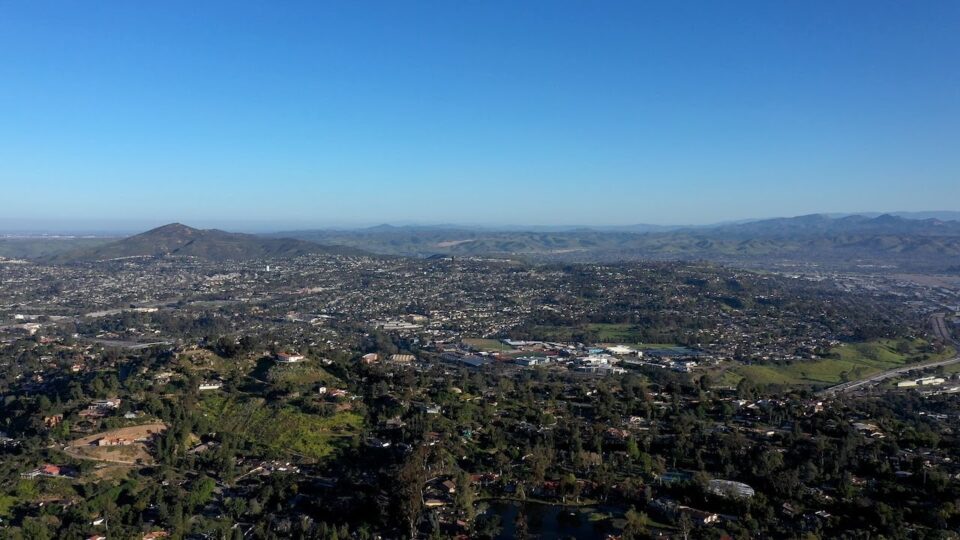aerial photo neighborhood with many trees and open space