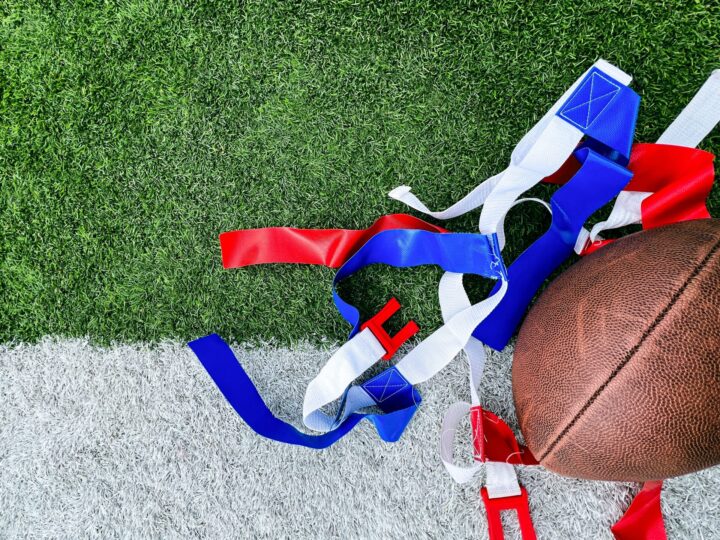 A football and flags on a field