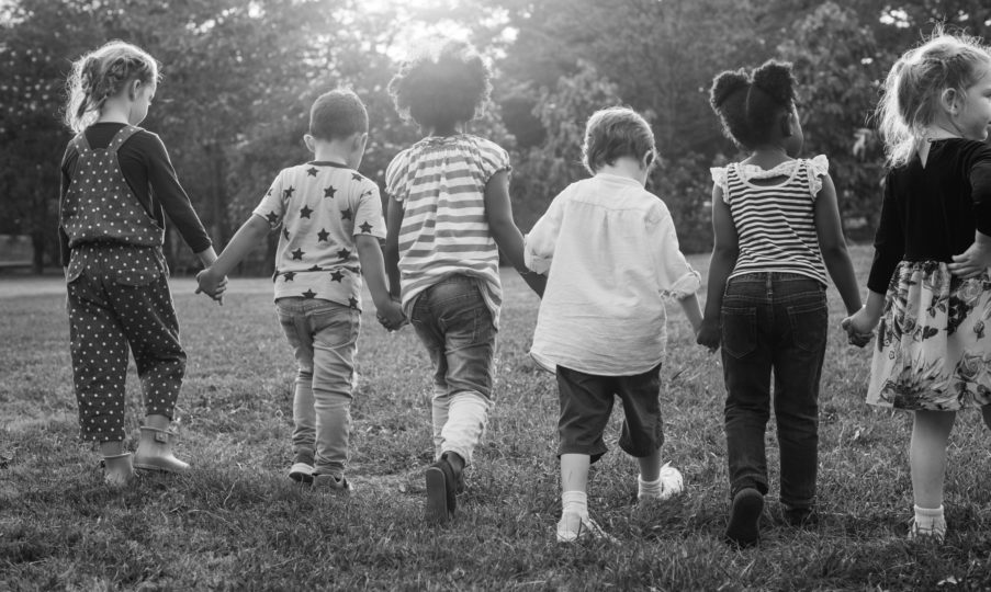 Children walking hand in hand